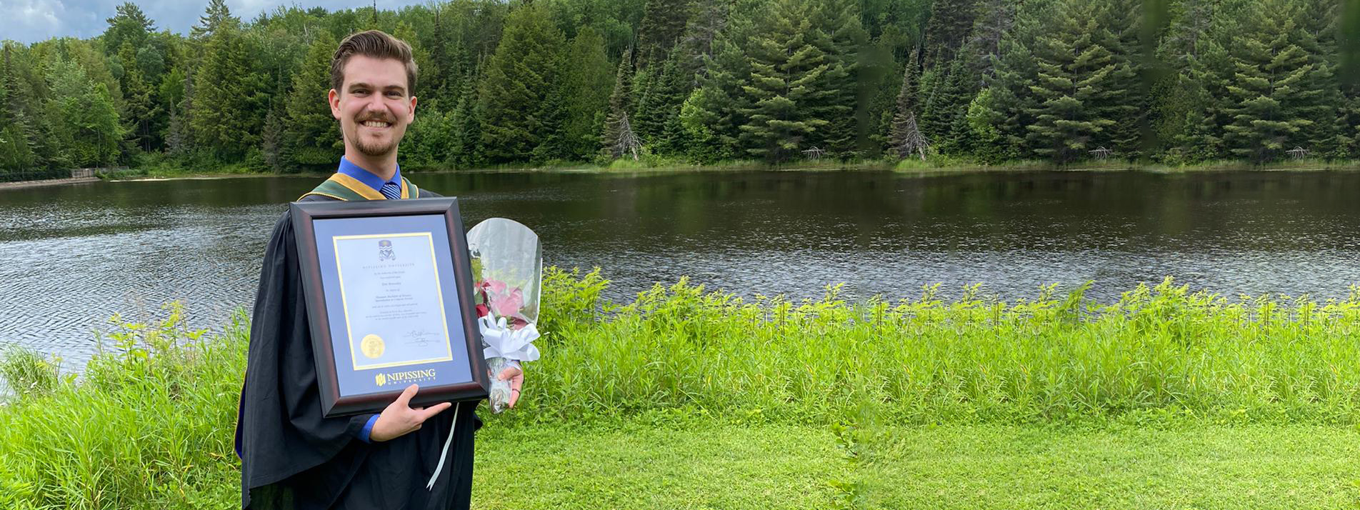 Graduate with Degree Frame