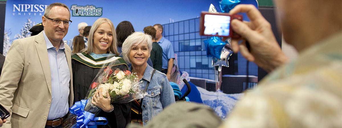 Graduate photo with family