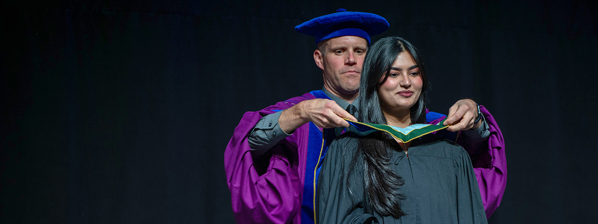 Graduand receives hood