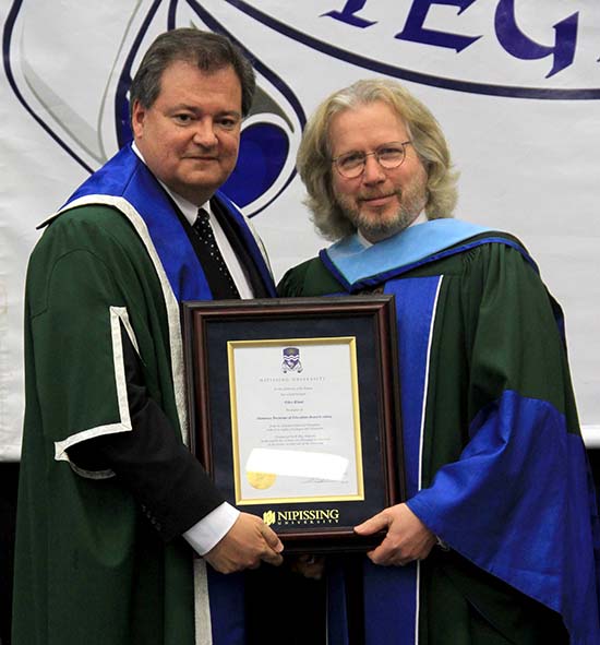 Giles Blunt with honorary doctorate