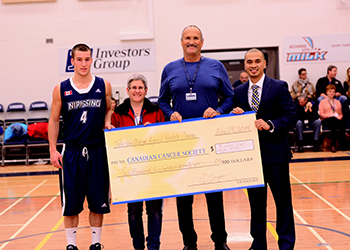 Cheque donation Dec. 1, 2014