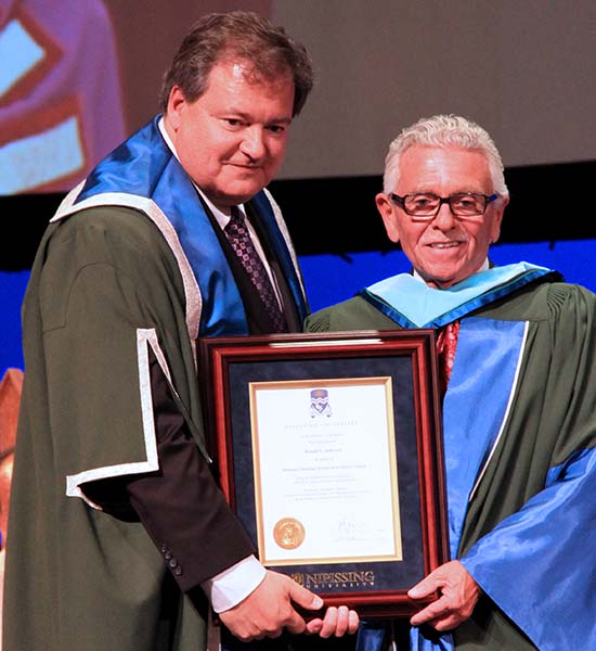 Ron Jamieson receiving honorary doctorate