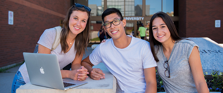 Students outside front doors
