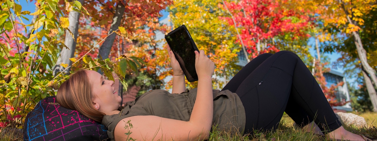 Student with iPad