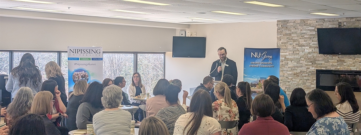 Alumni & Advancement Manager, Steven Smits speaks to the group of faculty and staff