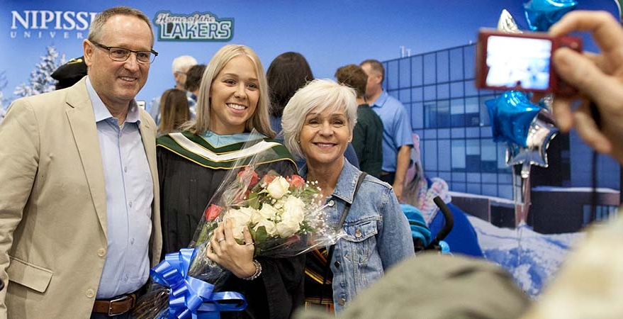 Graduate photo with family