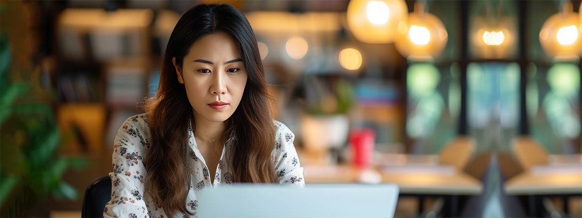 Woman register for course on laptop