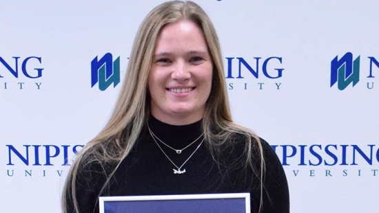 Marilyn Fortin with award