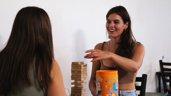 Lakers students and alumni playing board games
