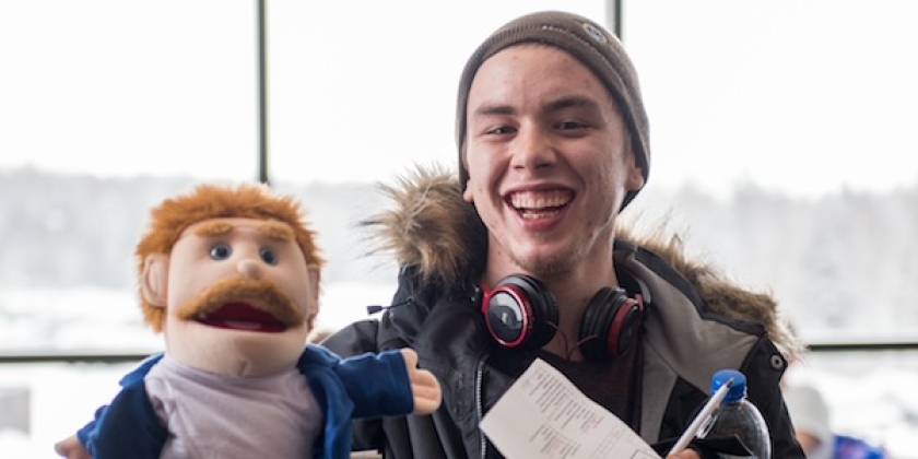 Student enjoys tour of the library during Debwendizon
