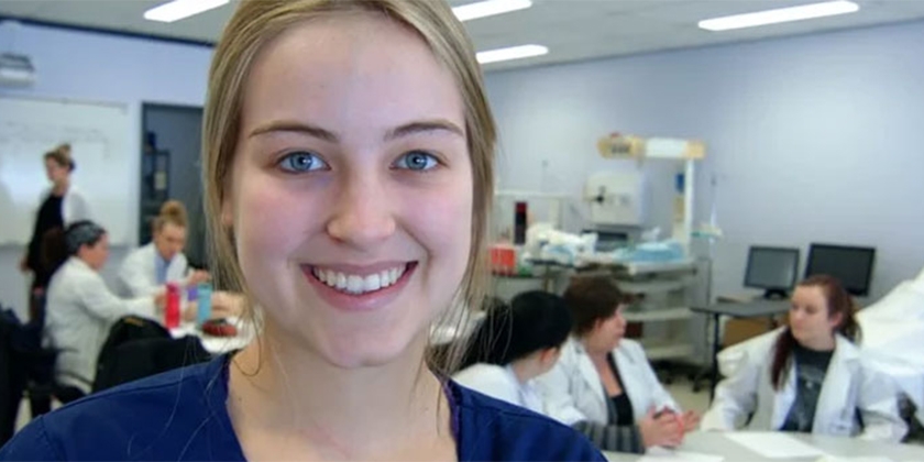 nursing student in sim lab