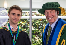 Recipient Hayden Llyod and Chancellor Dr. Russell stand together in convocation regalia.
