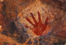 Image of a handprint on a rock face