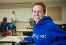 Happy student in class