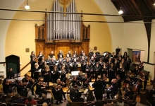 Photo of Near North Voices choir members performing in a church