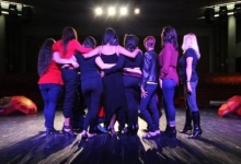 Project ArmHer cast on stage