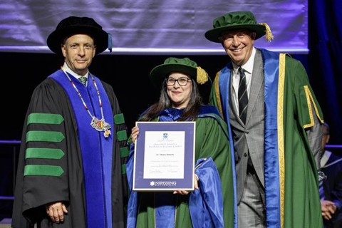 Tiffany Roberts receives award