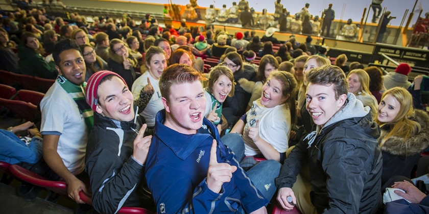 A group of excited Lakers fans support the varsity hockey team at Memorial Gardens