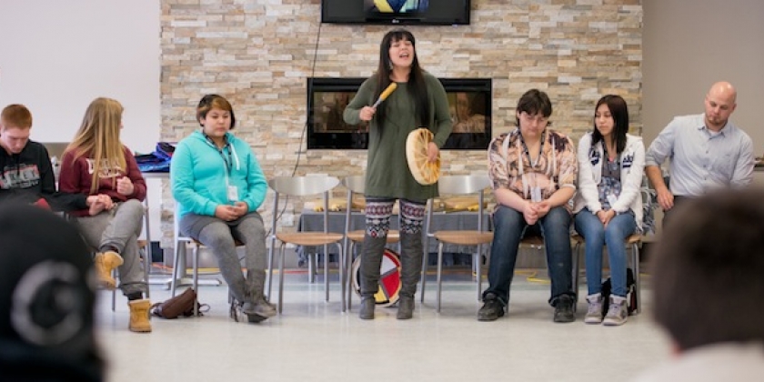 Wiidooktaadwin Year end conference, students participate in Hand drum teachings and songs ​