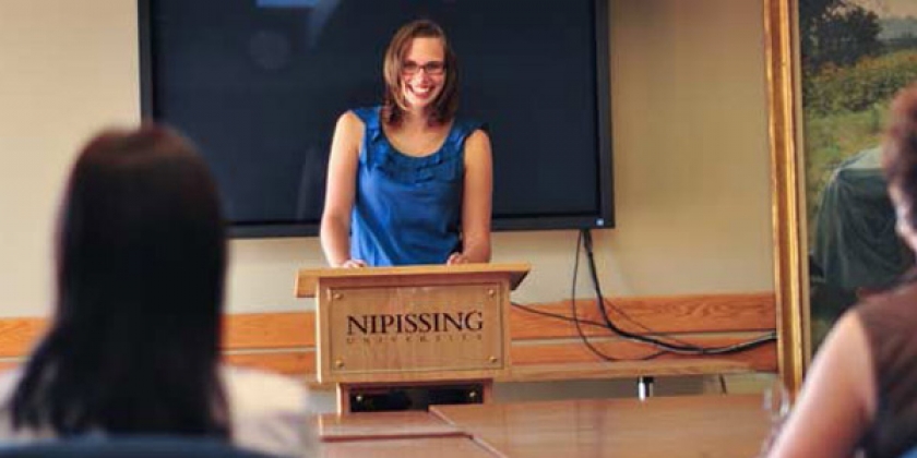 Lecturer at podium